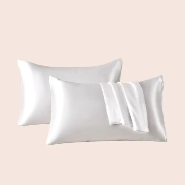 Paire de taies d'oreiller en satin couleur blanche