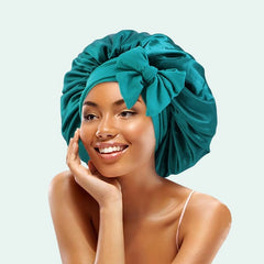 Bonnet de nuit brillant extensible en satin bleu pétrole