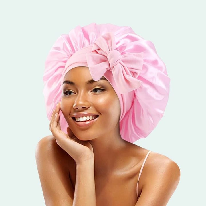 Bonnet de nuit brillant extensible en satin rose