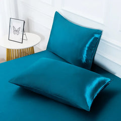 Drap-housse en satin brillant et taies d'oreillers bleu pétrole l Satin Lifestyle