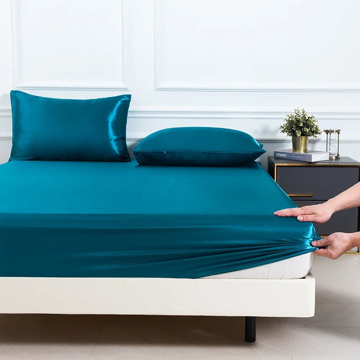 Drap-housse en satin brillant et taies d'oreillers bleu pétrole l Satin Lifestyle