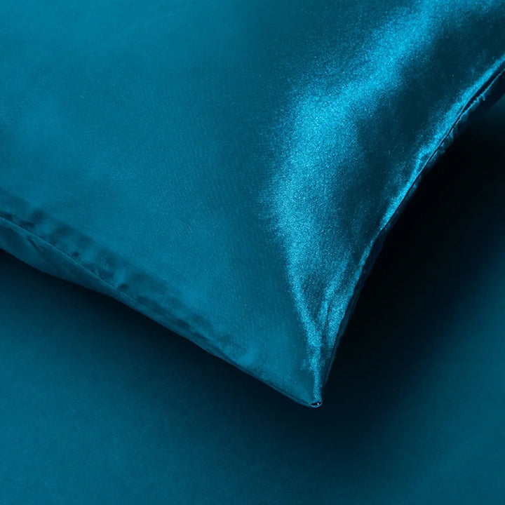 Drap-housse en satin brillant et taies d'oreillers bleu pétrole l Satin Lifestyle