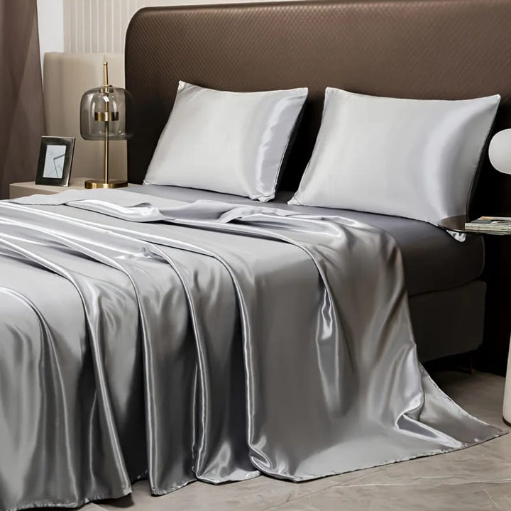 Drap plat uni en satin brillant gris