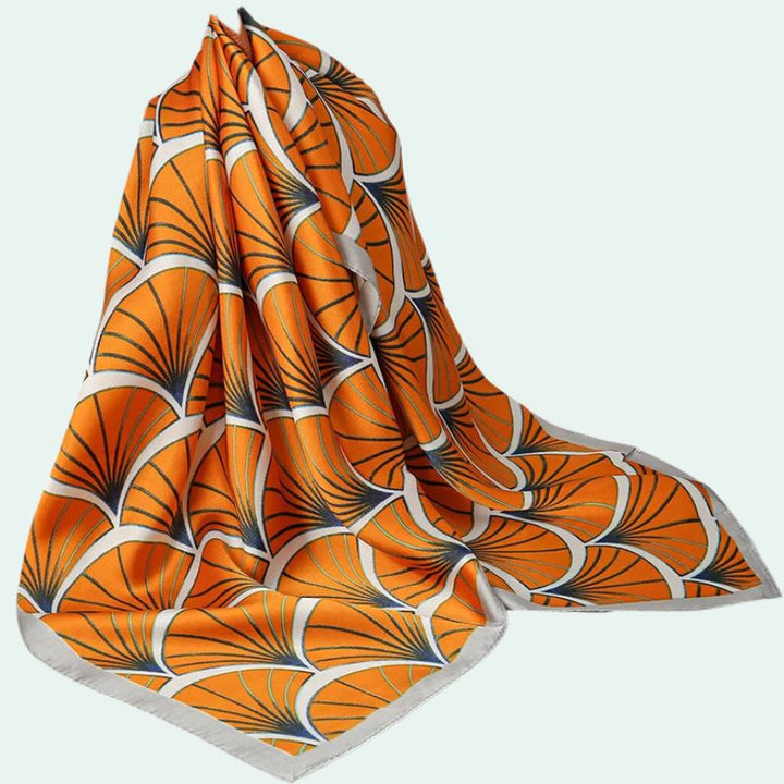Foulard carré en satin motif éventails art orange