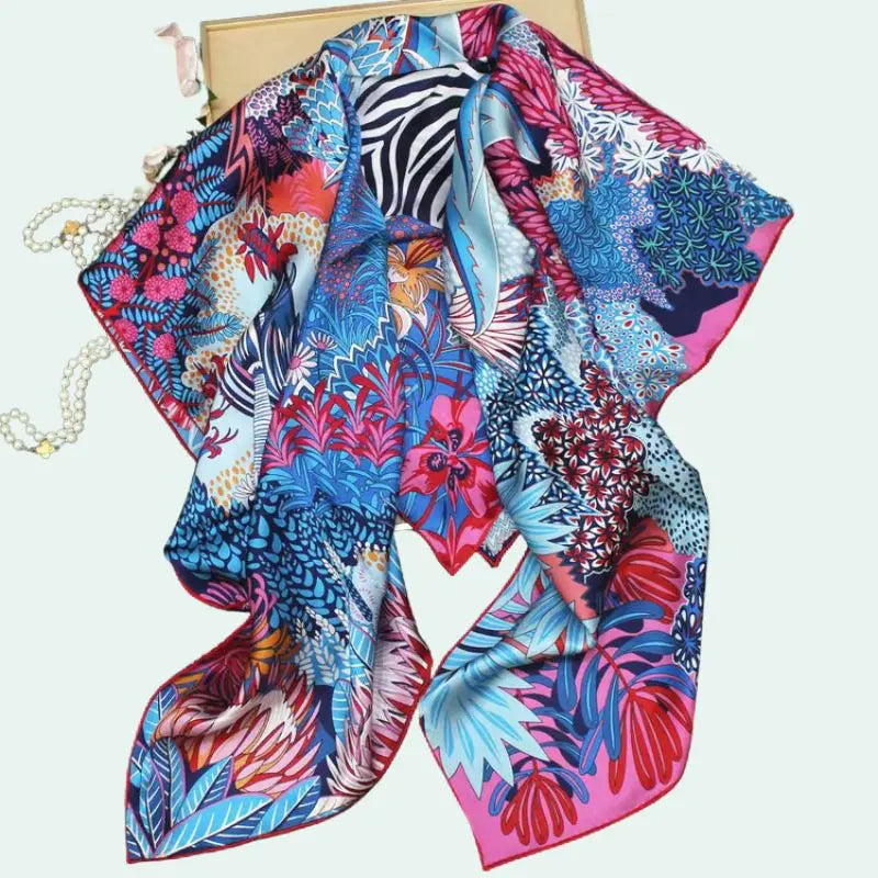 Foulard carré 100% soie de mûrier motif zèbre et plantes rose et bleu plié