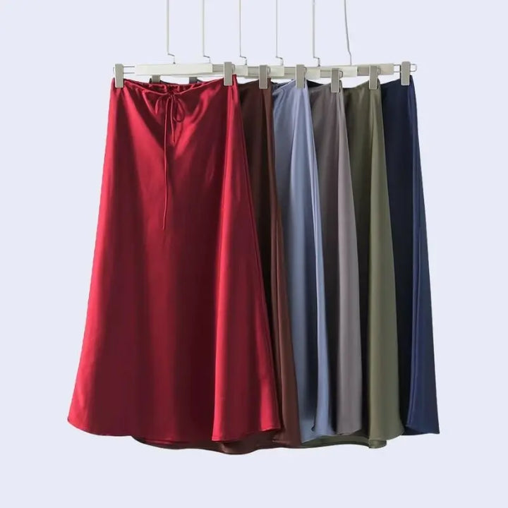 Plusieurs jupes longues coupe droite ajustable en acétate et élasthanne