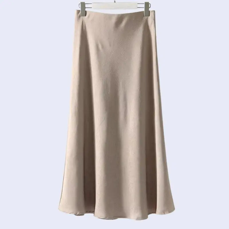 Jupe longue unie texturée en satin couleur champagne