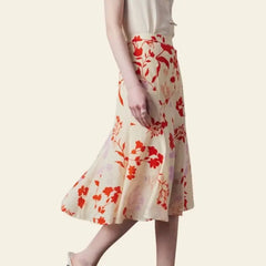Jupe mi-mollet motifs fleurs rouges en soie véritable