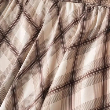 Tissu d'une jupe mi-mollet motif tartan beige en soie véritable
