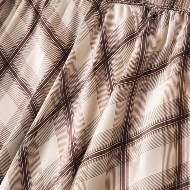 Tissu d'une jupe mi-mollet motif tartan beige en soie véritable