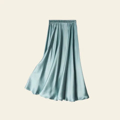 Jupe plissée unie effet satiné en soie véritable couleur bleu turquoise