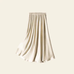 Jupe plissée unie effet satiné en soie véritable couleur champagne