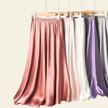 Modèles de jupes plissées unies effet satiné en soie véritable