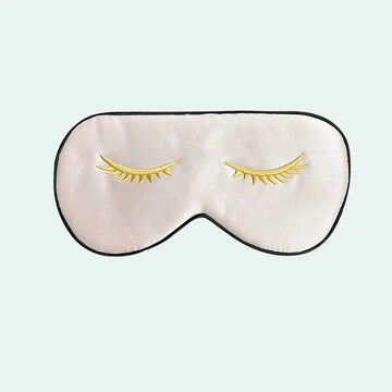 Masque de nuit en soie de mûrier motif cils dorés