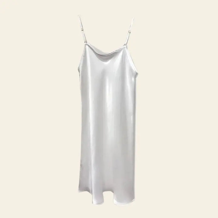 Mini-robe brillante à bretelles fines 100% soie couleur blanche