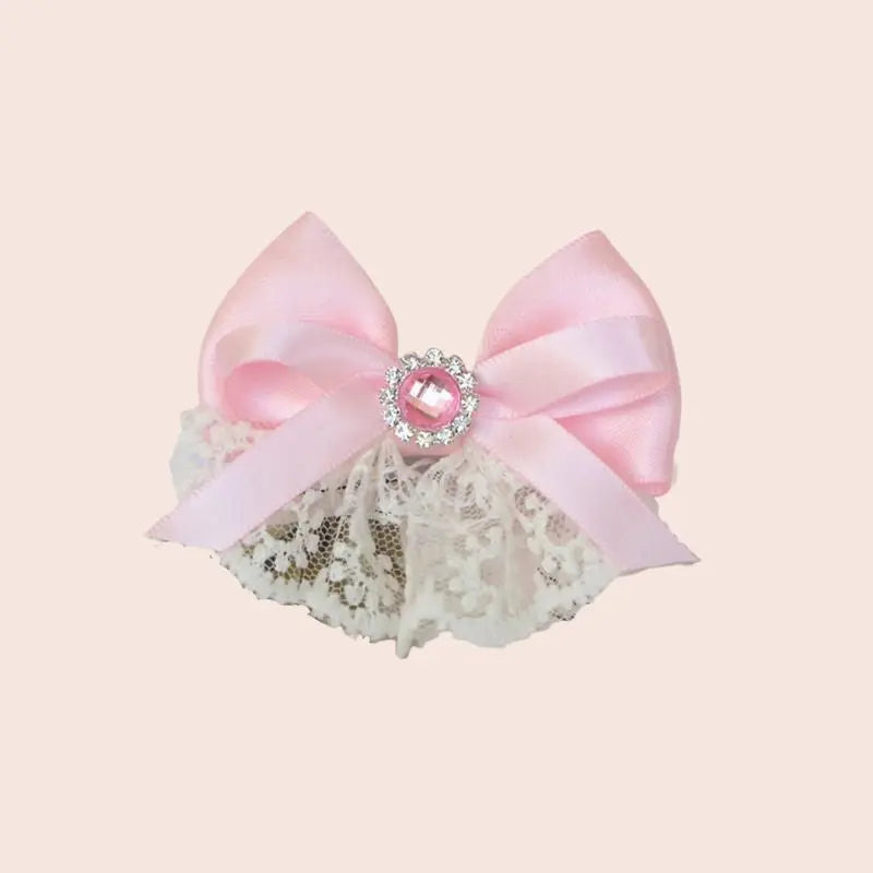 Nœud ruban en satin et dentelle rose pastel