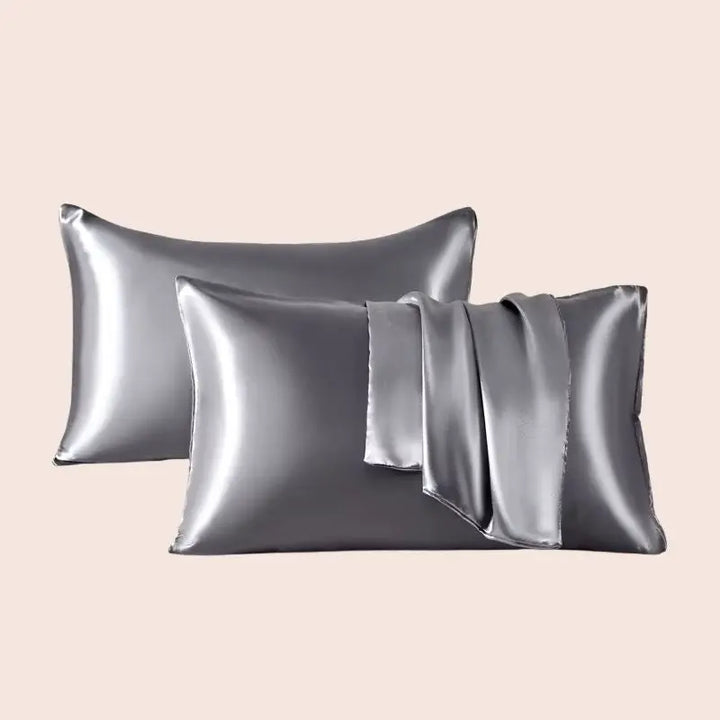 Paire de taies d'oreiller en satin couleur argenté