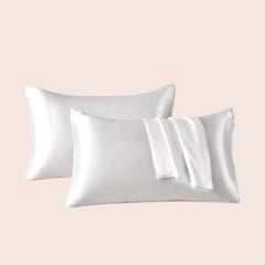 Paire de taies d'oreiller en satin couleur blanche