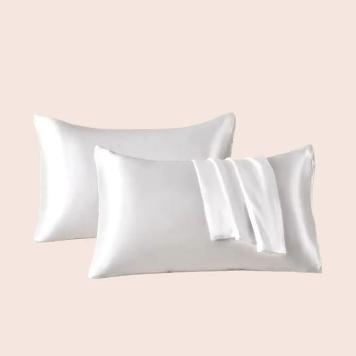 Paire de taies d'oreiller en satin couleur blanche