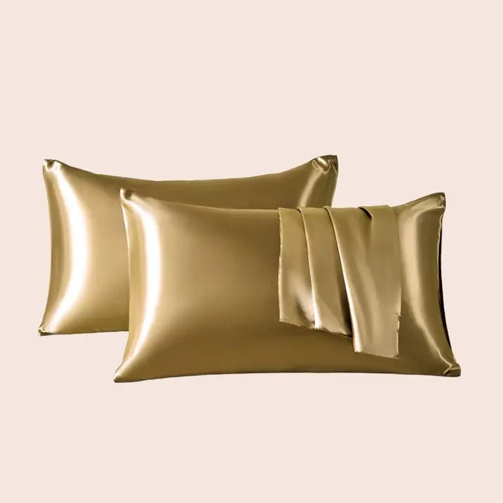 Paire de taies d'oreiller en satin couleur dorée