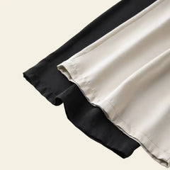 Bas des pantalons droits chics unis en soie