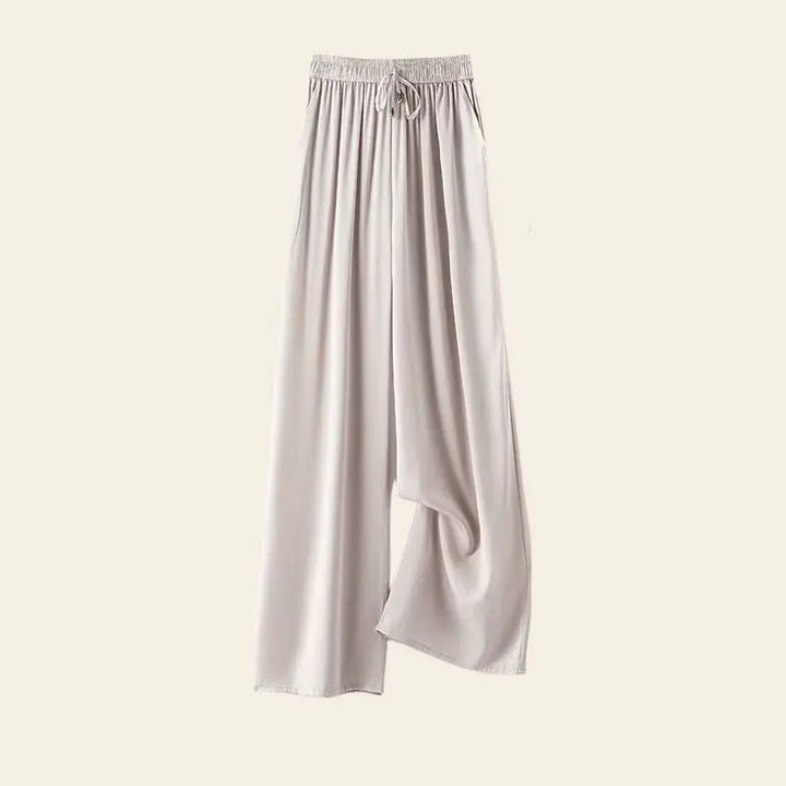 Pantalon élégant coupe fluide et longue en soie de mûrier beige