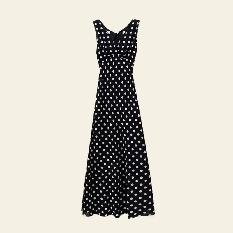Robe longue noire à pois blancs sans manches pure soie