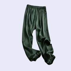 Sarouel brillant chevilles en satin vert foncé