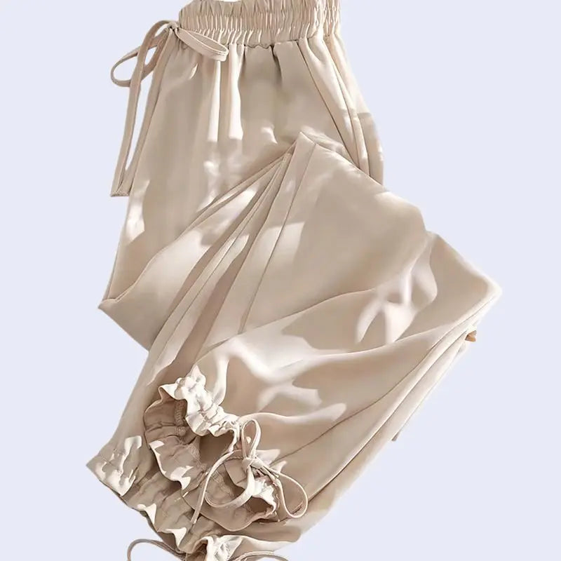 Sarouel plissé poches et nœuds en satin champagne