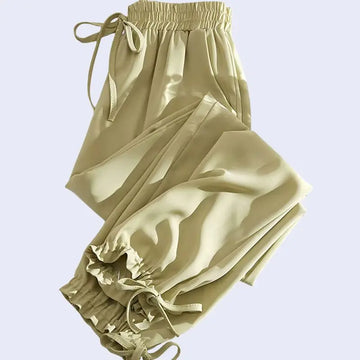 Sarouel plissé poches et nœuds en satin jaune olive