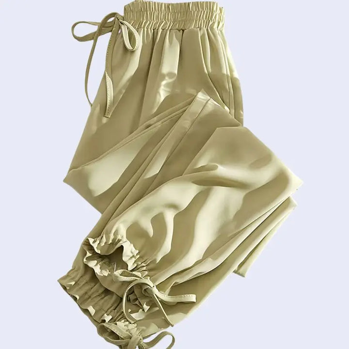 Sarouel plissé poches et nœuds en satin jaune olive