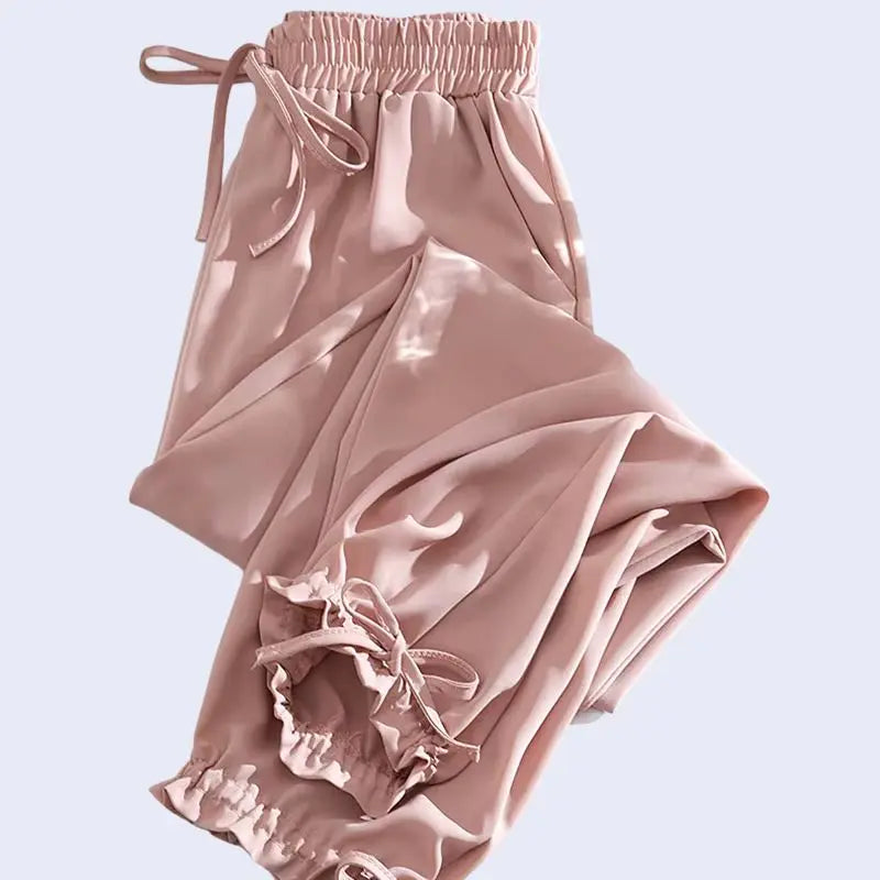 Sarouel plissé poches et nœuds en satin rose